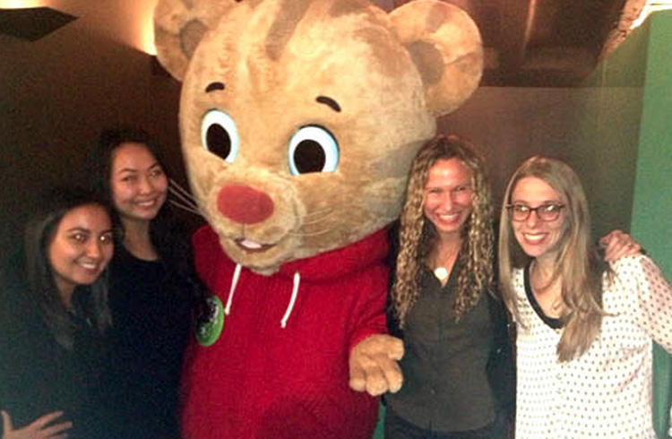 Grand Communications team members (from left to right) Rachel Tringali, Samantha Chin, Alison Grand and Jaymie Presberg join the star of the PBS KIDS preschool hit Daniel Tiger’s Neighborhood at a special screening and panel discussion at the School of Visual Arts Theatre with the Children’s Media Association