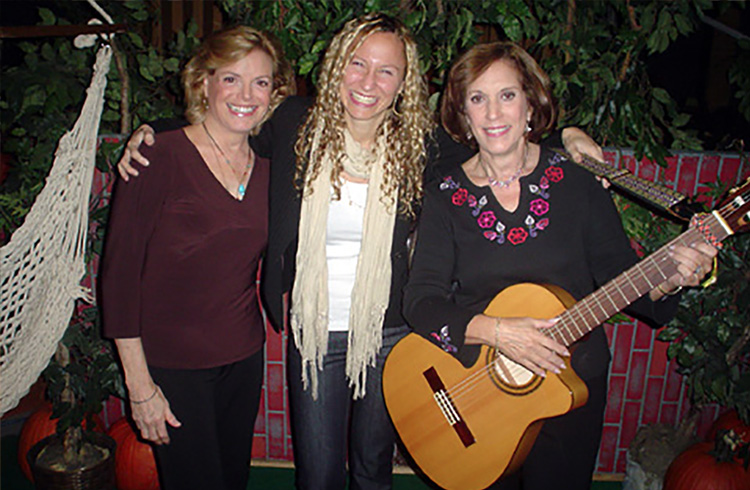 Alison Grand humming along with the stars of The Magic Garden, Carole Demas and Paula Janis, on the set of CW11 Morning News to celebrate the launch of their new DVD from Koch Records