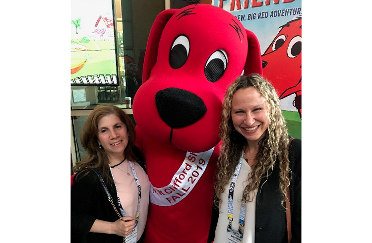 It’s puppy love for Grand Communications’ Alison Grand and Laura Liebeck at Scholastic Entertainment’s cocktail party celebrating the upcoming reboot of Clifford The Big Red Dog at Licensing Expo in Vegas